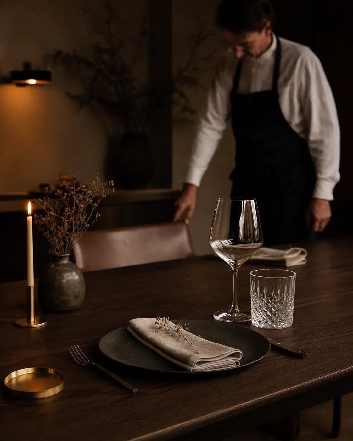 A private dining table being prepared before guests arrive