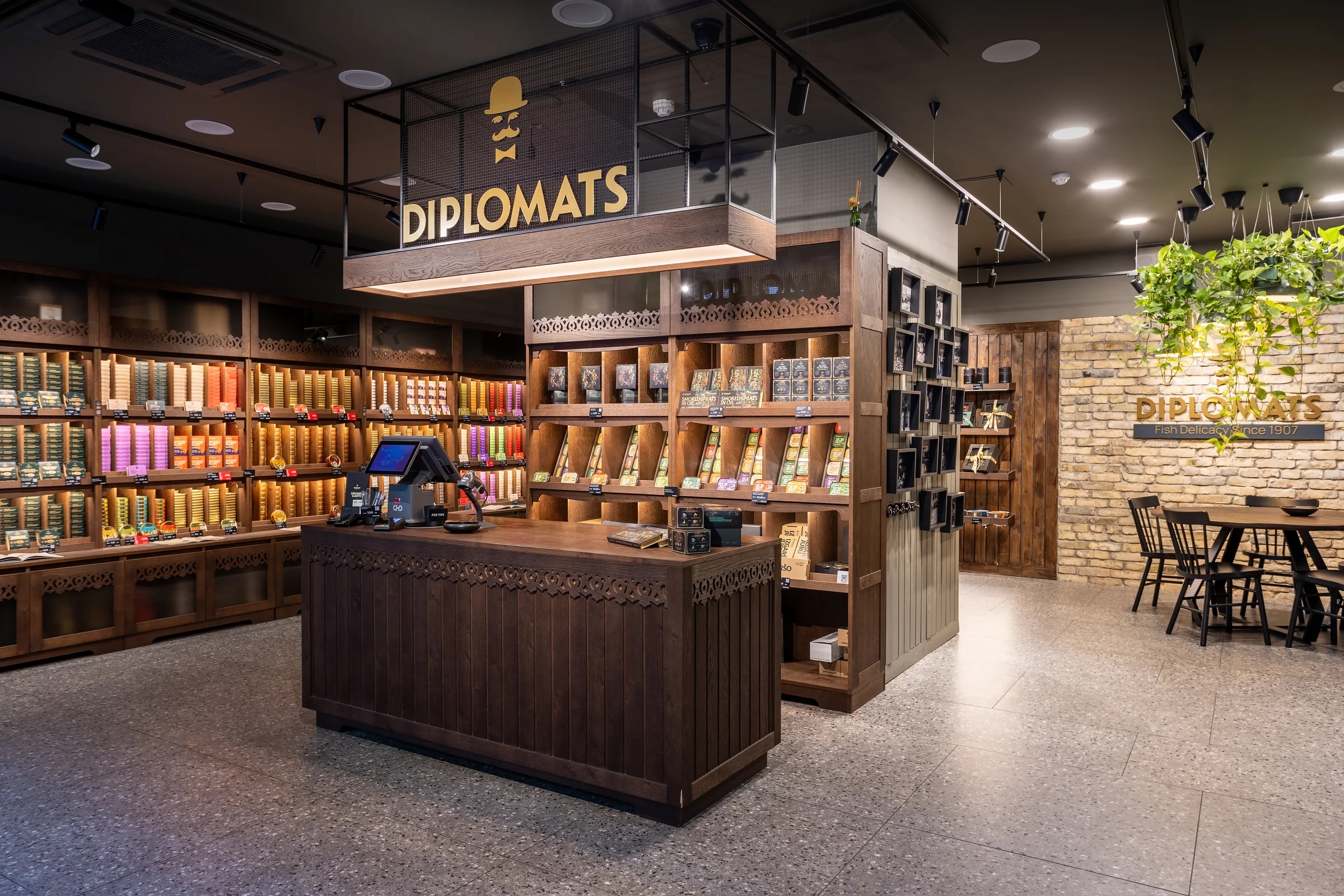The Diplomats store interior with seafood products arranged across dark wooden displays