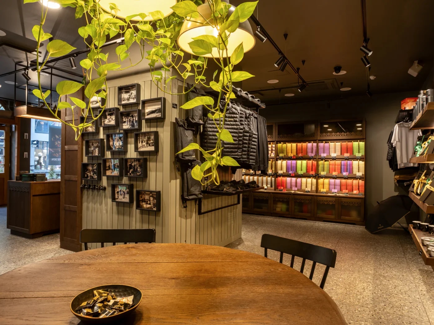 Completed Diplomats Riga store with product walls, furniture and a welcoming central table