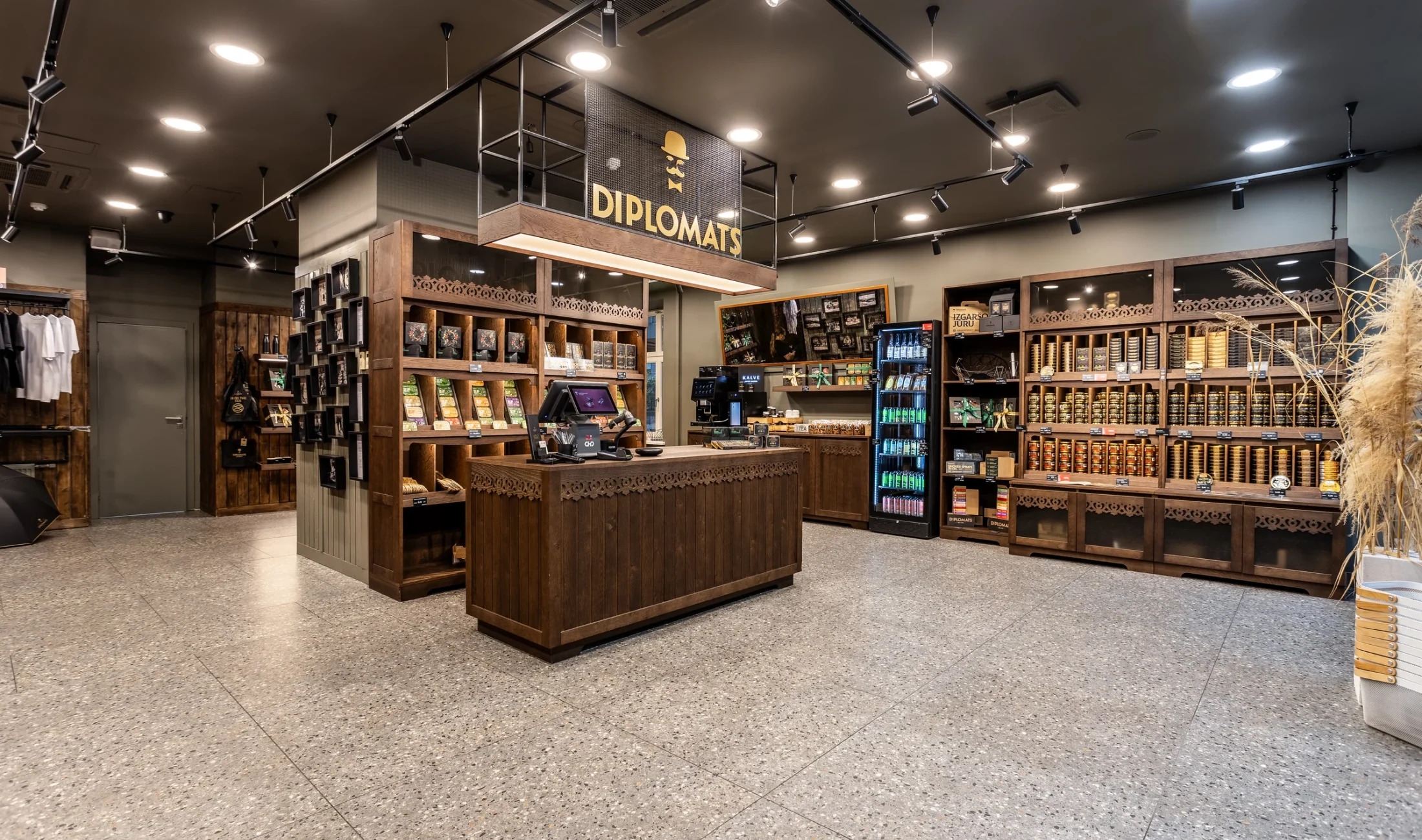 The completed Diplomats concept store in Riga with its central counter and full product display