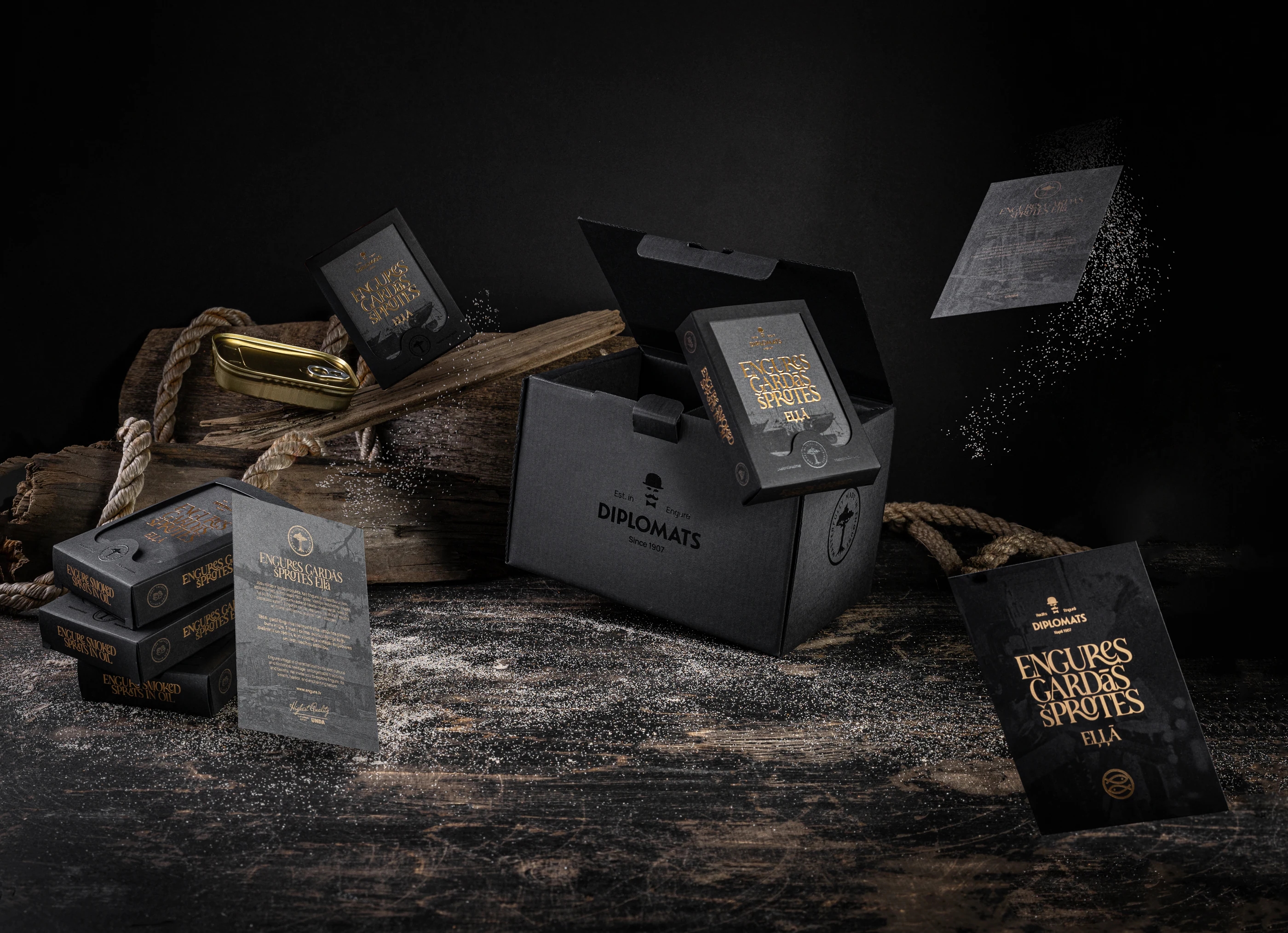 Engures Gardās Šprotes gift packaging arranged with a traditional sprat can, timber and rope