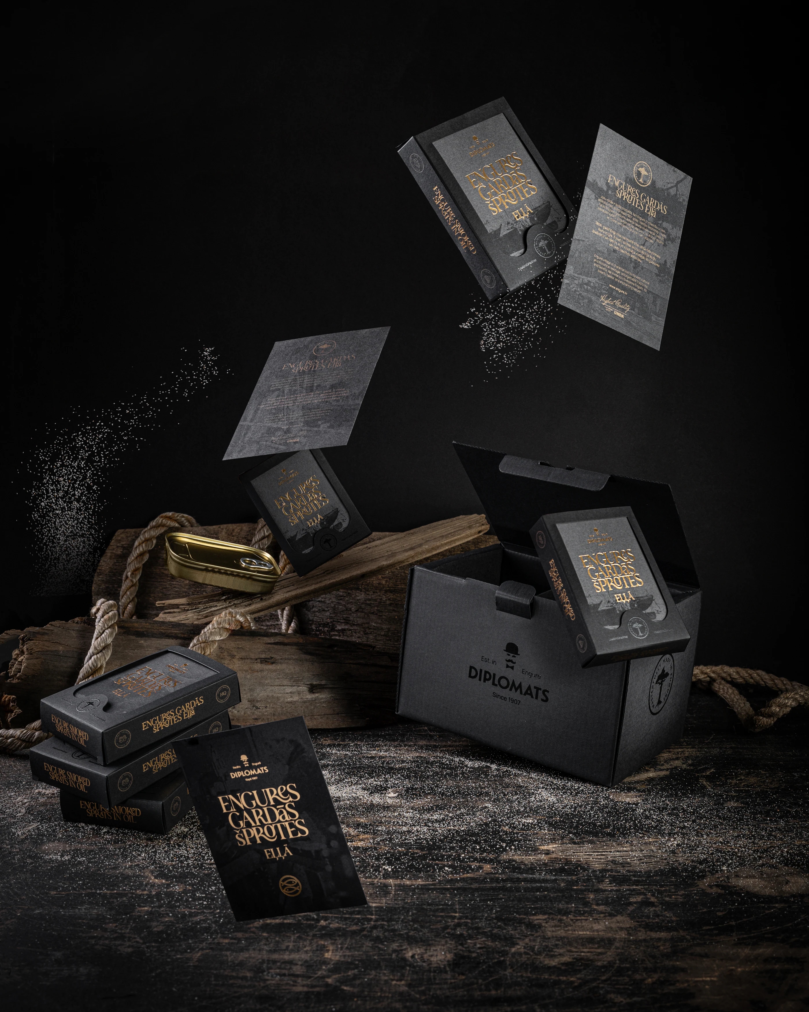 Engure sprats products arranged with traditional wooden fishing equipment