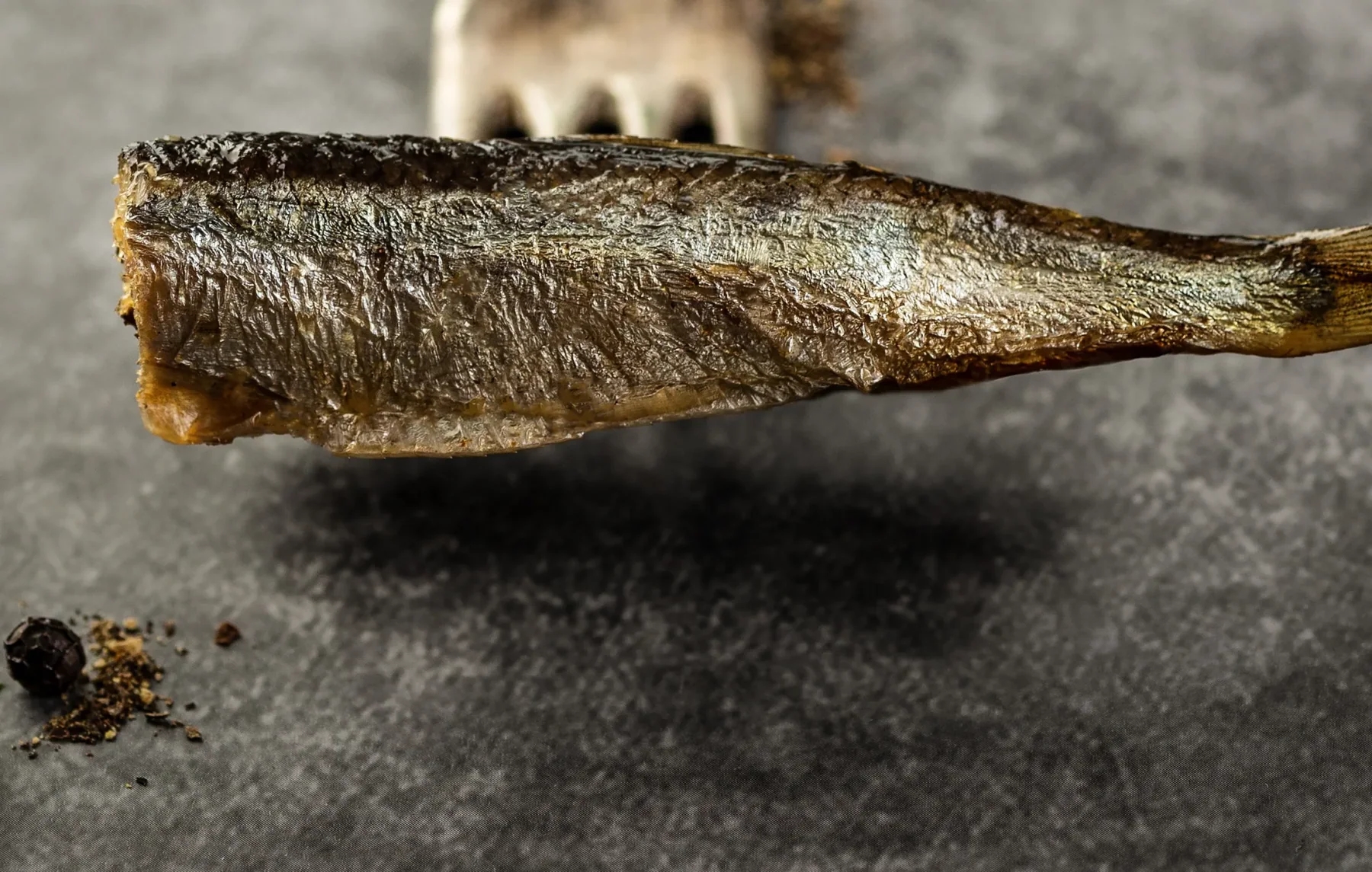 Naturally smoked sprat shown in close detail
