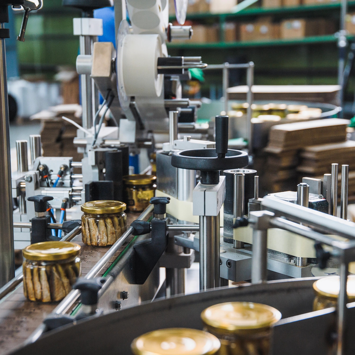 Diplomats seafood jars moving through the production line in Engure, Latvia