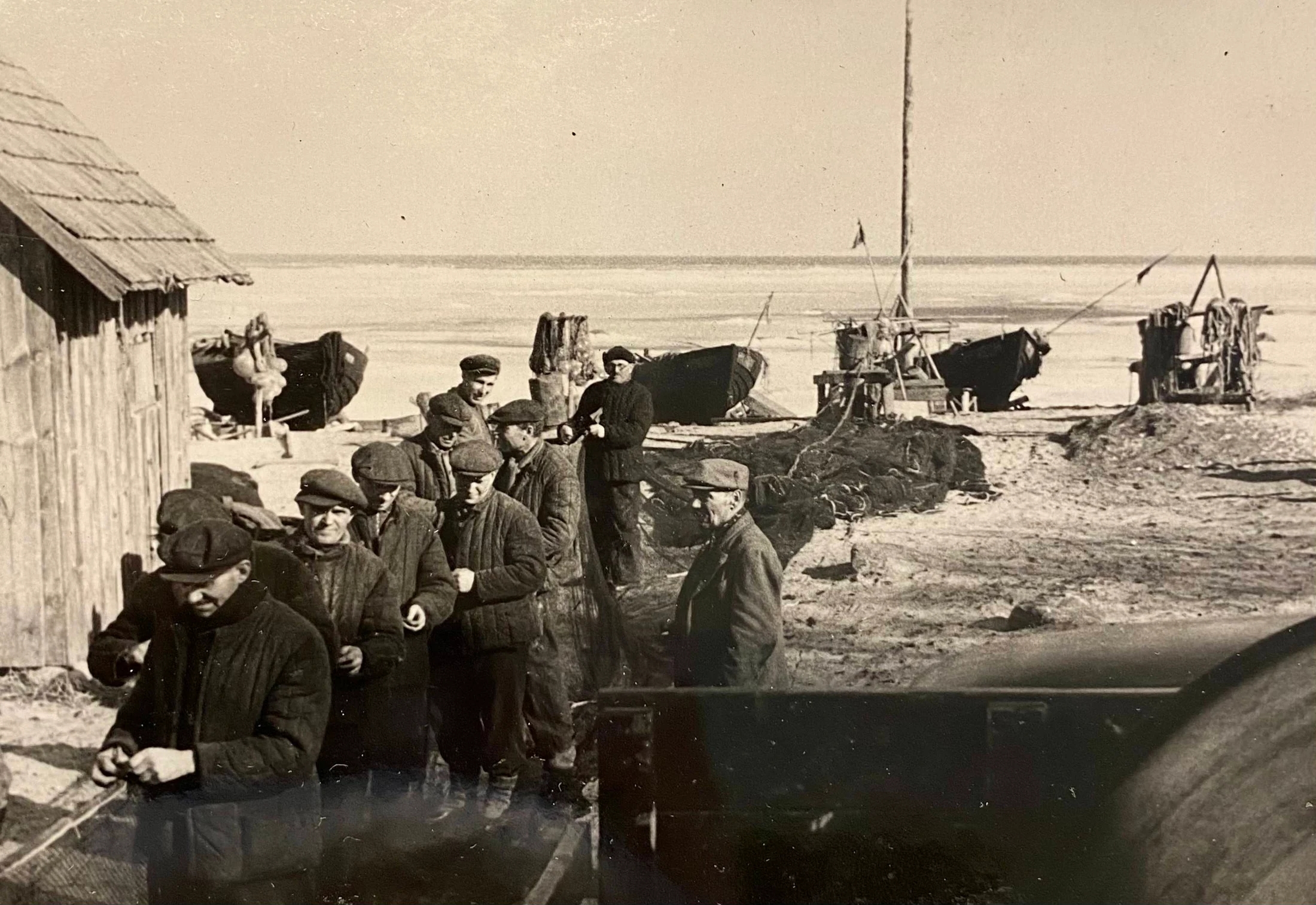 Engure fishing community working beside boats and nets in 1954